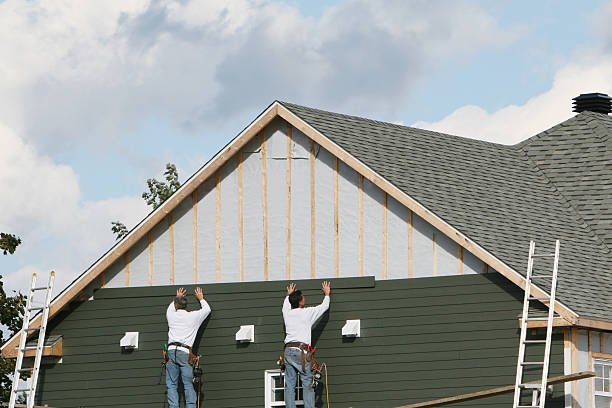 Professional Siding Contractor technician working in Trappe, PA